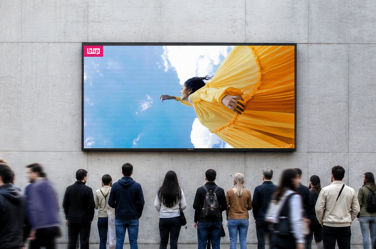 Crowd viewing a digital billboard display