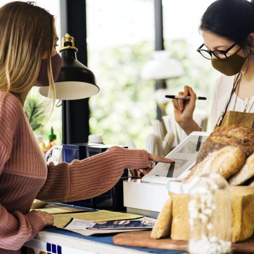 Two women collaborating in creative workspace