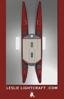 Top-down view of red and gray boat on water