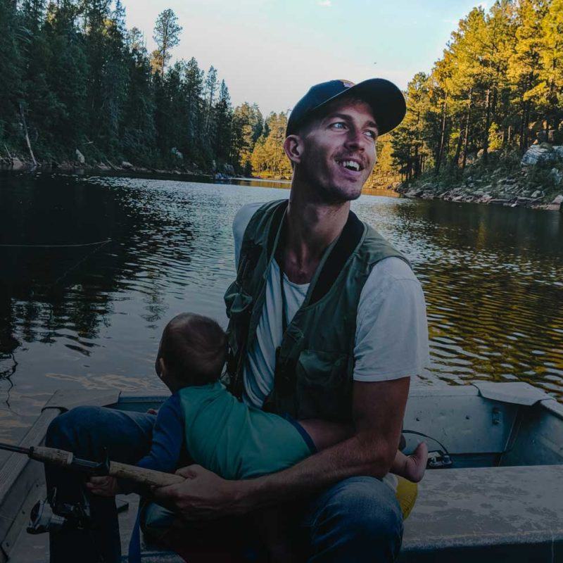 Man fishing by a lake