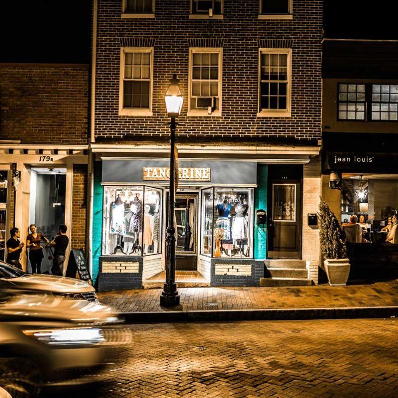 Night street scene of small-town storefronts