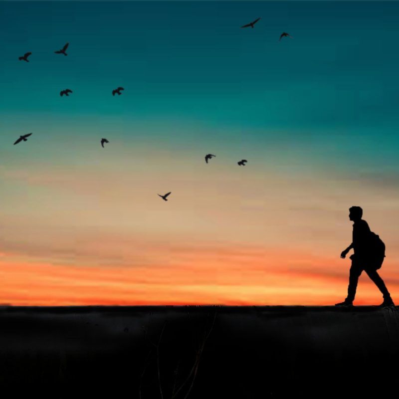 silhouette of person walking