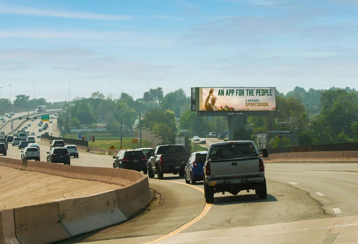 Digital billboard over freeway traffic
