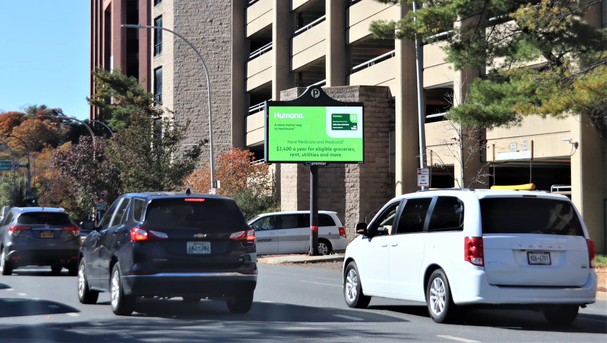 Digital billboard in a city street setting